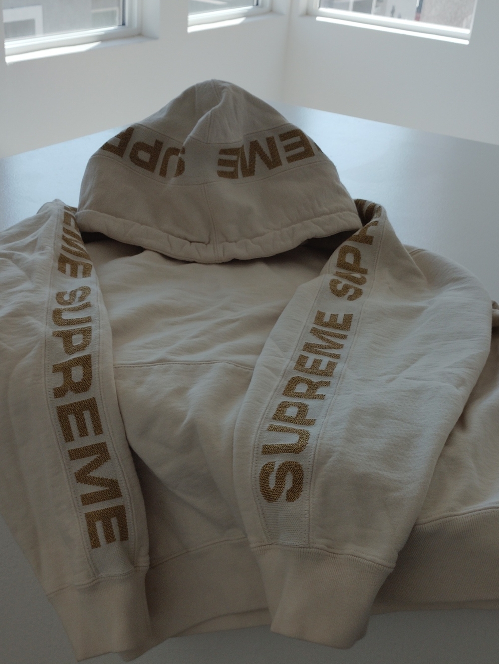 Supreme Beige Hoodie with Gold Logo Stripe